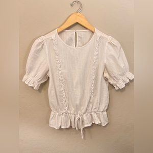 Sheer white cropped top. Fits like an XS.